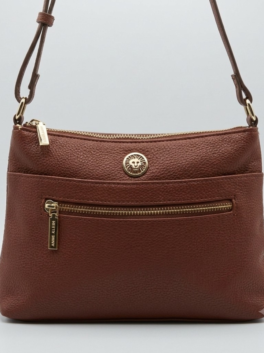 Anne Klein Cognac Brown Pebbled Faux Leather Crossbody Purse with Lion Logo